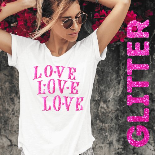 Woman wearing a white t-shirt with 'LOVE' in pink glitter text, standing against a dark background with pink glitter text.